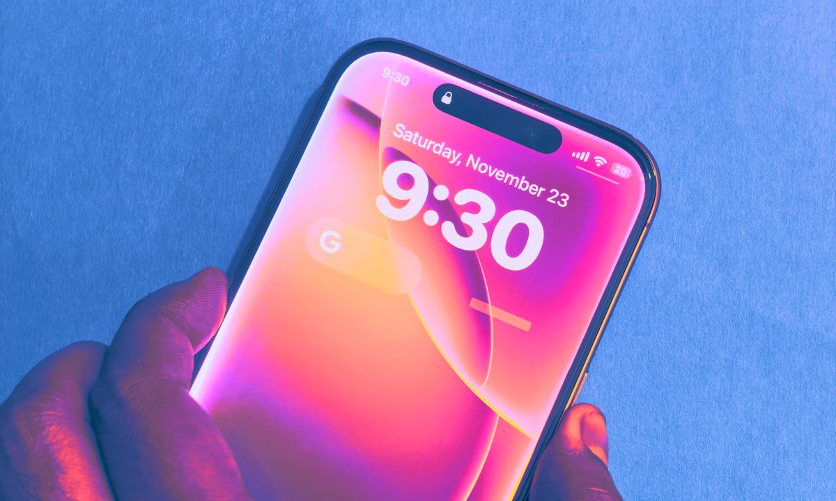Pulling up Siri on lock screen of iPhone.