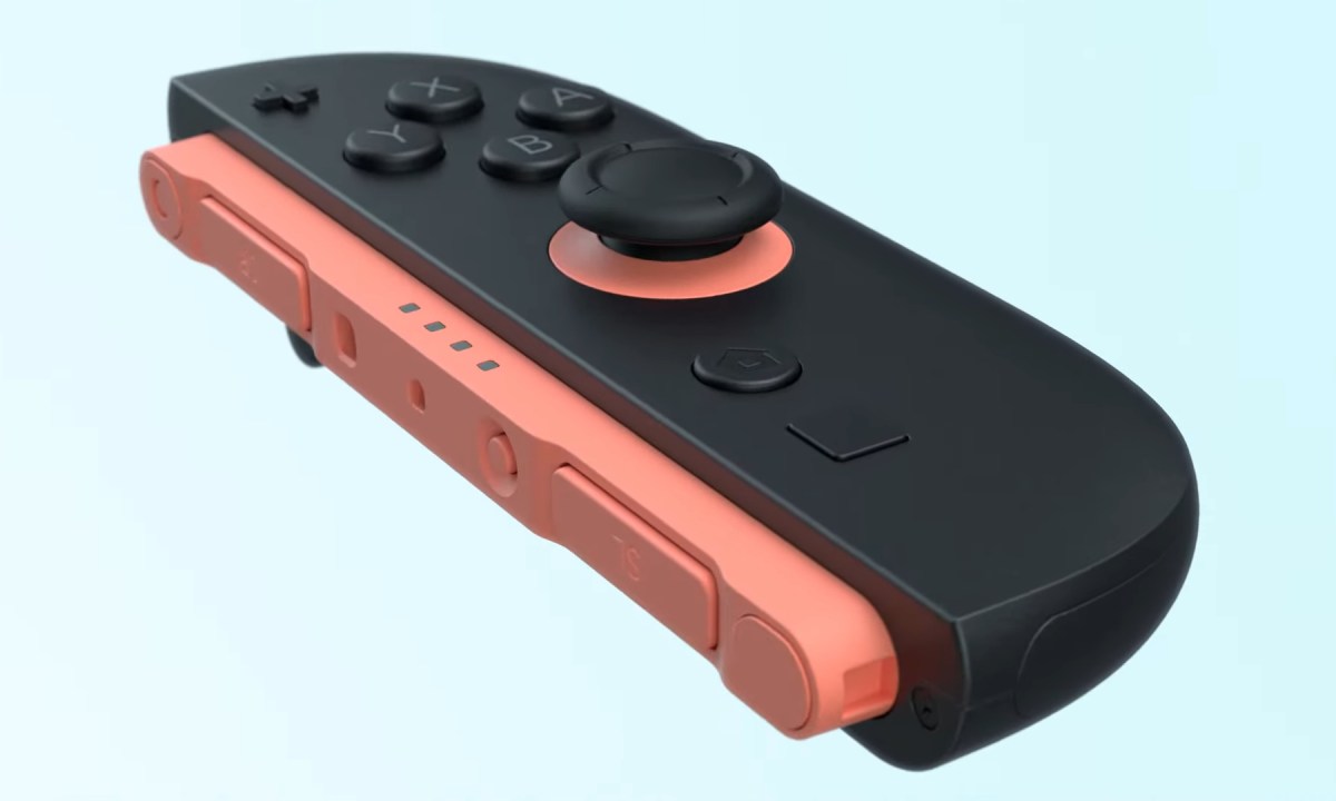 A black and pink Switch 2 joy-con.