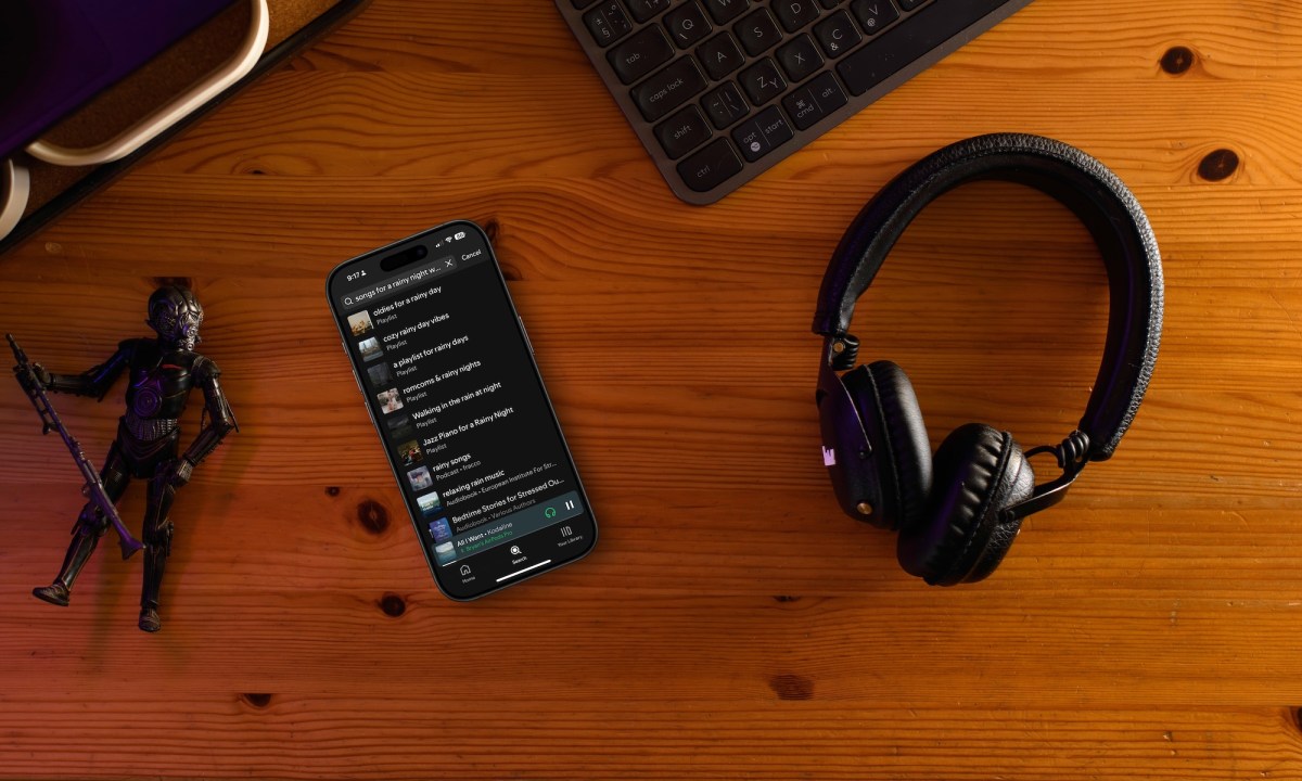 Image showing an iPhone with Spotify's AI discovery feature.