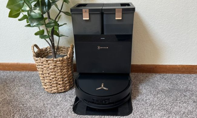 Ecovacs X8 Pro Omni near a plant